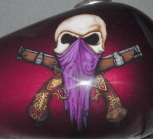 Skull with crossed pistols